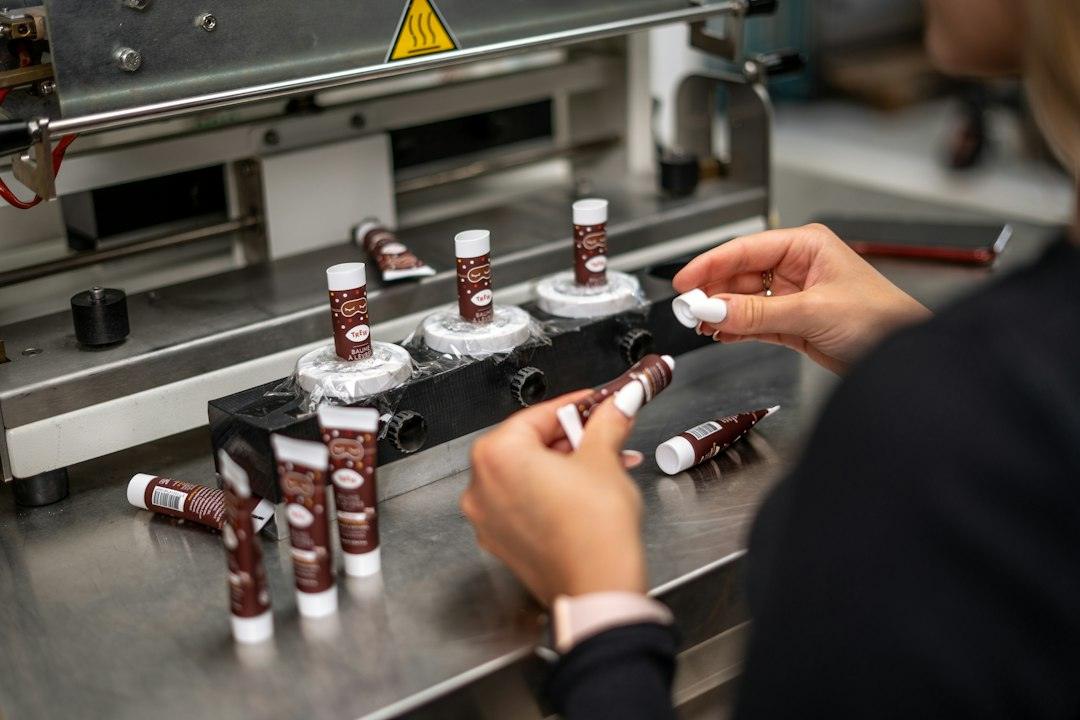 Cosmetic lip care production illustrating the 2026 peptide lip skinification formulation trend