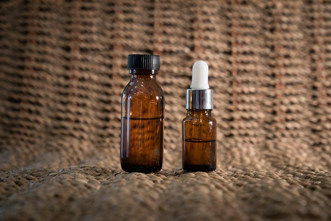 Amber cosmetic serum bottles illustrating sticky and tacky serum texture troubleshooting for formulators